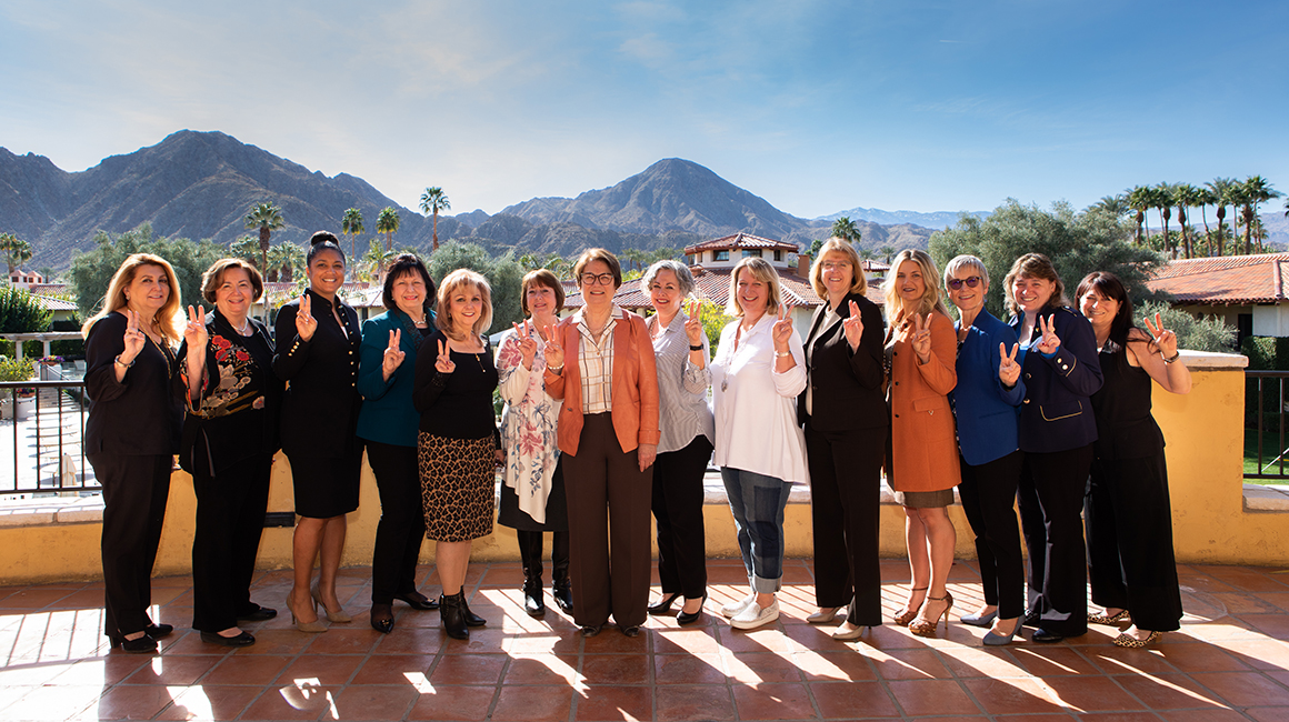 Before their annual breakfast, Dean Gallagher poses with women in the Dean’s Superintendents Advisory Group at the ACSA’s Superintendents' Symposium. (Photo/Brian Morri)