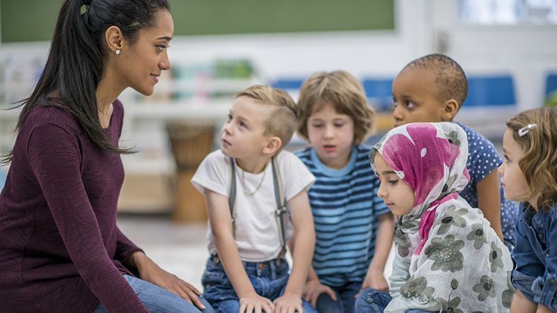 Teacher with students