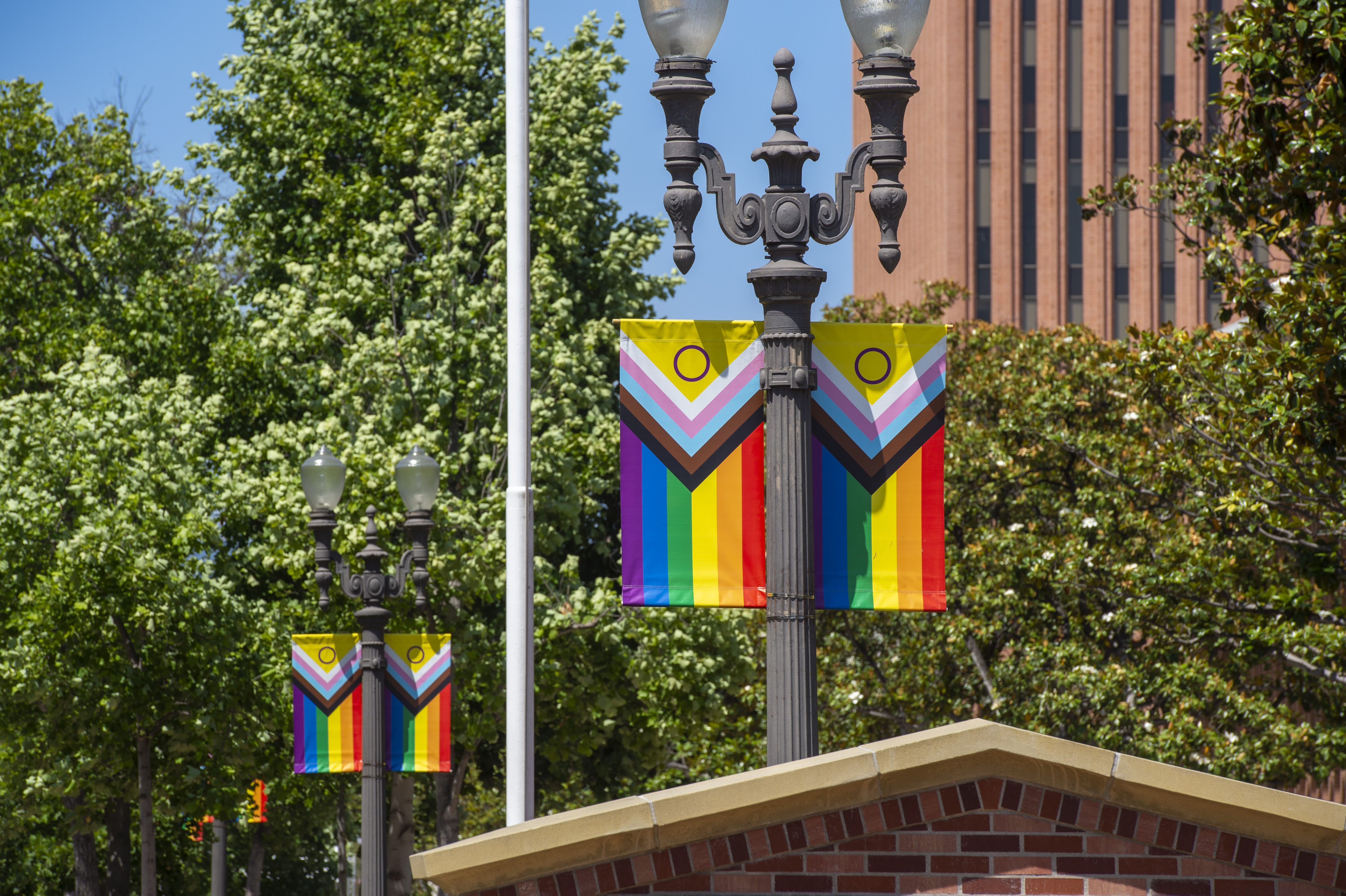 A pride banner hangs at the USC campus during Pride Month.