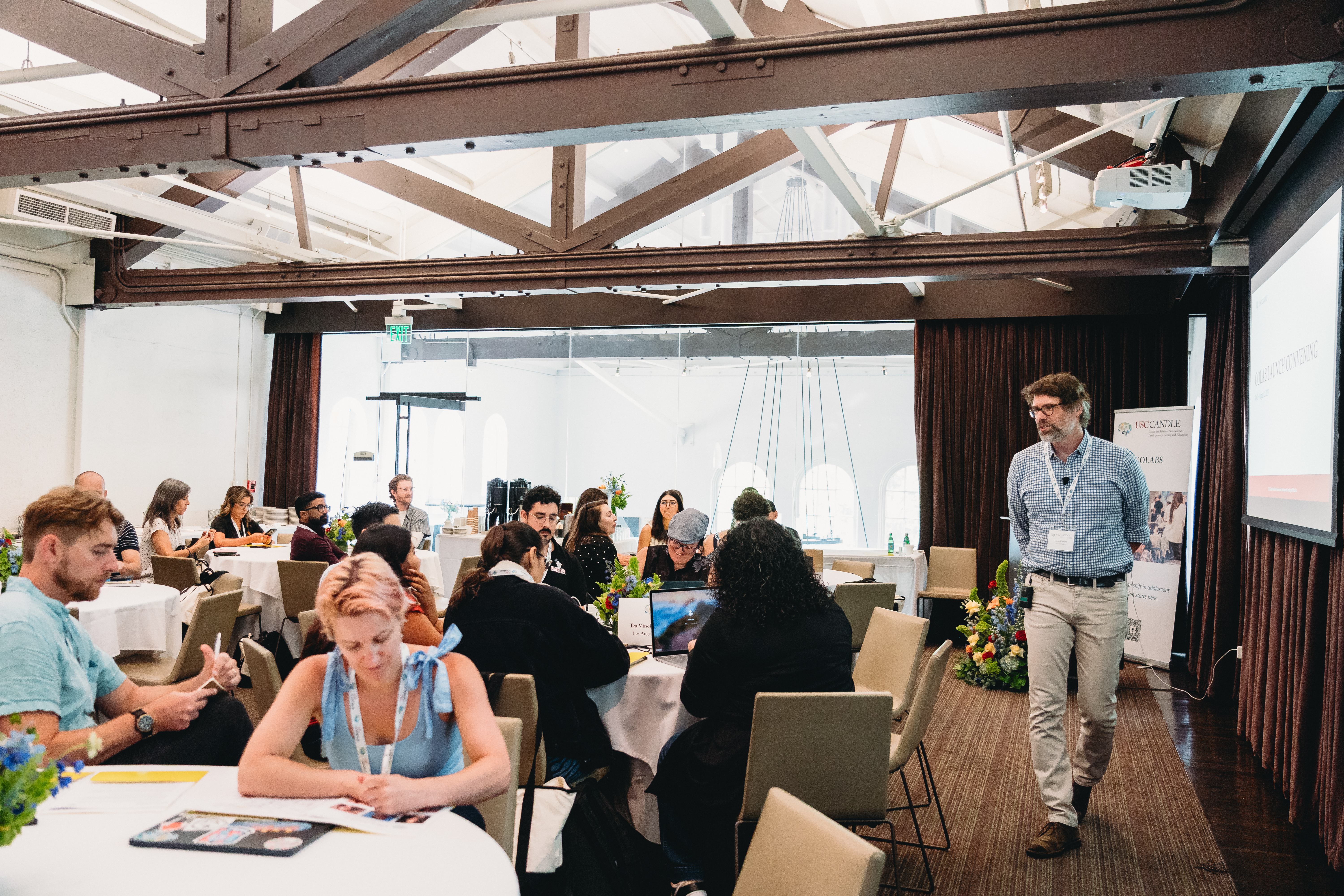 Doug Knecht (far right) facilitates an exercise during the launch event.