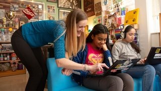 AMERICANED_SUTTON_060 800x450.jpg English teacher with two students