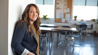 linkedin-sales-solutions-NpyF7rjqmq4-unsplash 800x450.jpg Woman standing