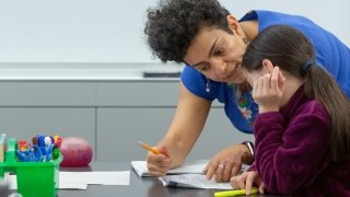 AMERICANED_UCLACOMM_100-1200x750.jpg teacher teaching kid