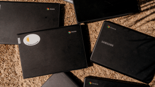 Photo of several laptops on the ground,