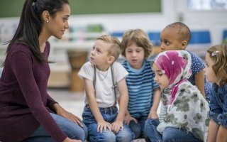 Teacher with students