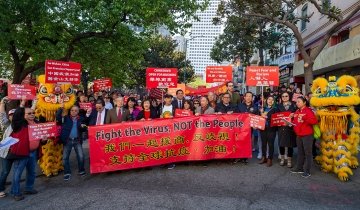 A rally that took place in San Francisco’s Chinatown in February called for communities to unite in the fight against COVID-19. (Photo/Associated Press, Y Ichuan Cao)