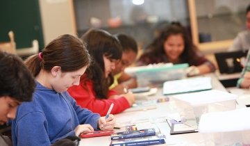 Students working in class material