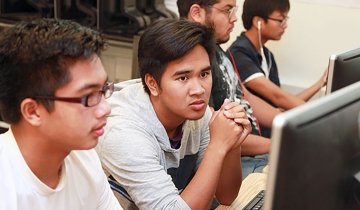 Students working on computers
