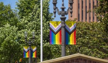 A pride banner hangs at the USC campus during Pride Month.