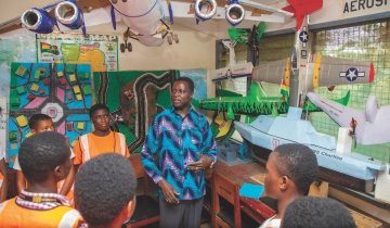 Ghana's minster of education meets with students at an all-girls high school in Ghana.