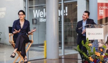 Photo of Mary Helen Immordino-Yang speaking at an event.