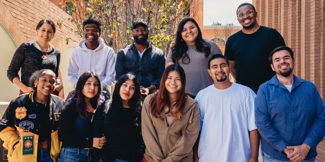 Participants and facilitators in the Belonging as Legacy program gather for a group portrait on the University Park Campus.