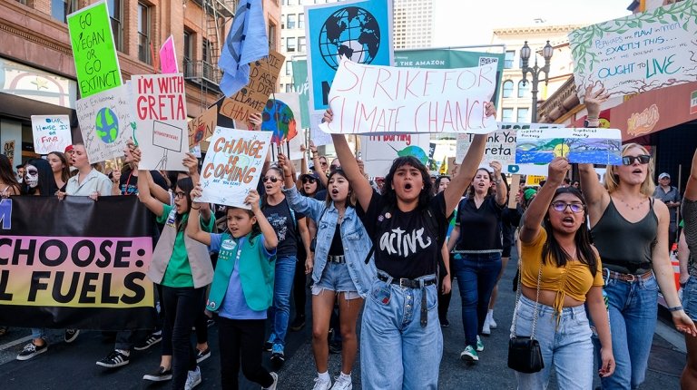 Climate activists participate in a student-led climate change march in L.A. on Friday, Nov. 1, 2019. (AP/Ringo H.W. Chiu)