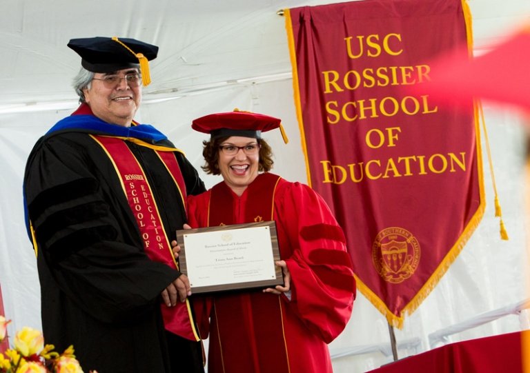 Dissertation Award of Merit recipient Trista Ann Beard with her dissertation chair, Dr. Reynaldo R. Baca. (Photo/Brian Morri, 211 Photography)