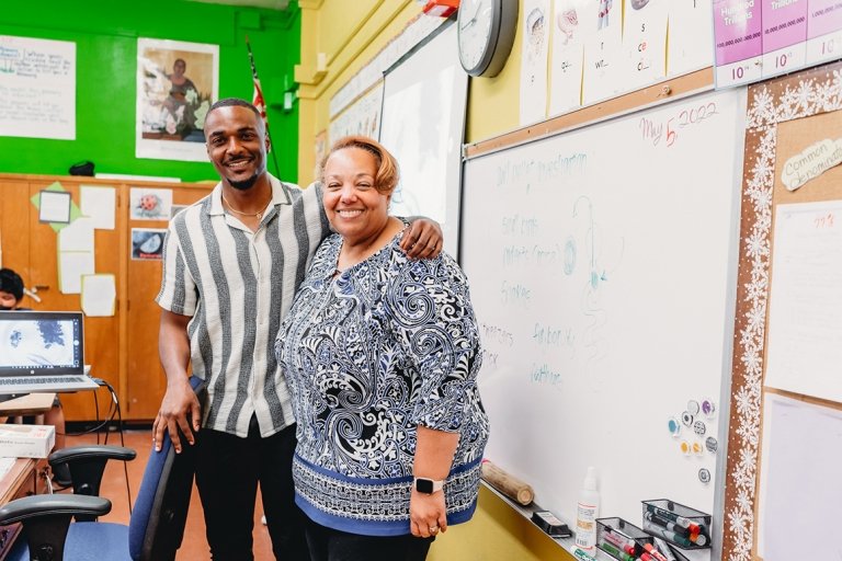 Scott and Mrs. Hamilton, his guiding teacher at 93rd Street Elementary School. (Rebecca Aranda)