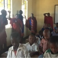 Tanzanian Primary School adults join classroom activities