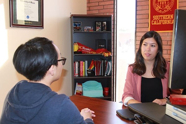 USC Rossier admission staff meets with a prospective student