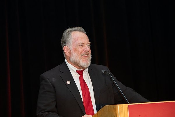 Superintendent Gregory Franklin stands behind a podium at the annual DSAG awards dinner in 2020.