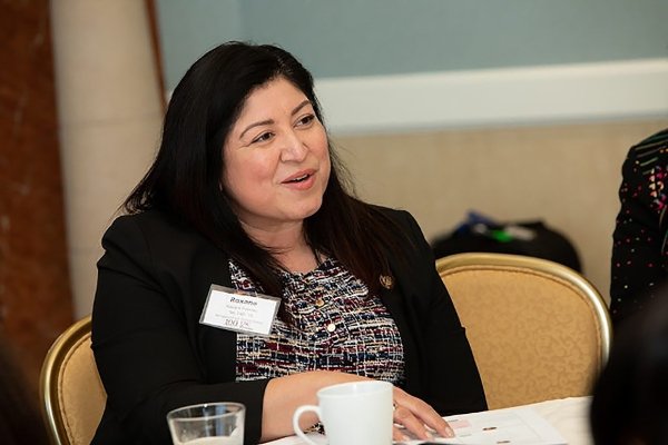 Roxane Fuentes, Superintendent, in conversation at a professional networking event
