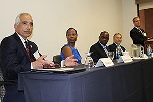 Panelists Mark Rocha PhD ’88, Kaneesha Tarrant EdD ’06, Chris McDonald EdD ’12 and Bill Bonaudi EdD ’03 and moderator Patrick Auerbach EdD ’08 discussed “Leadership and Collaboration at the Community College Level.”