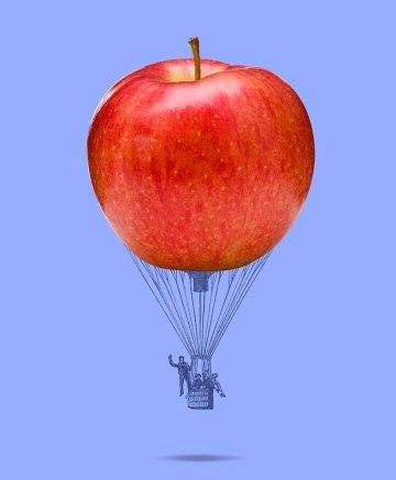 An illustration of an apple as a hot-air balloon.