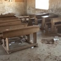 Broken benches at the Tanzanian Primary School