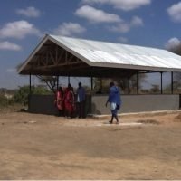 Tanzanian Primary School adults maintaining quality control