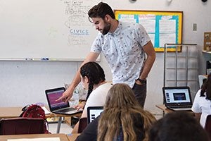 Teacher interacting with student