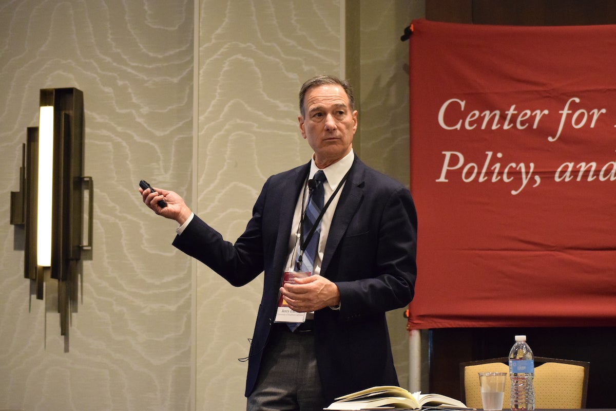 Man speaking at a Center for Policy event