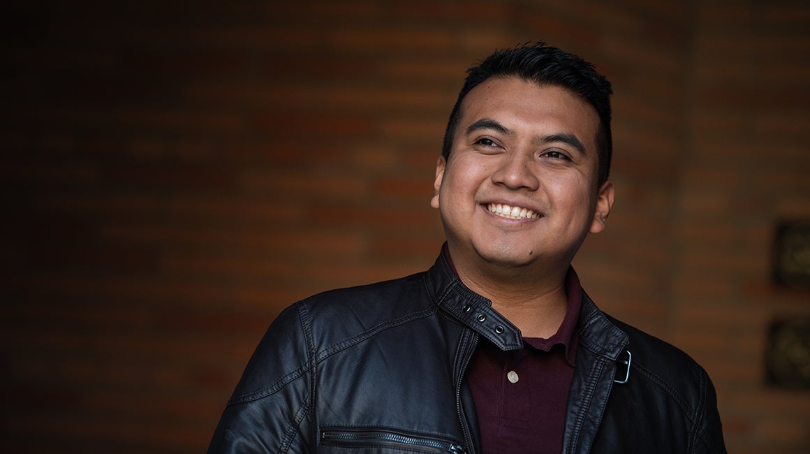 Portrait of a man smiling indoors