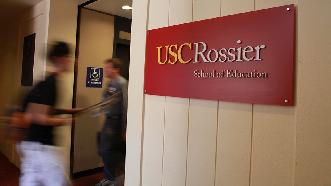 Hallway with a USC Rossier School of Education sign