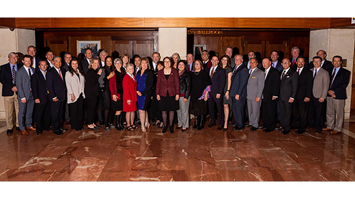 Group photo at a superintendents dinner event
